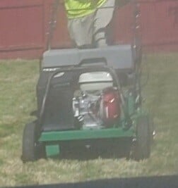 Aeration machine being operated by an employee of Kevin J Services in Euclid OH